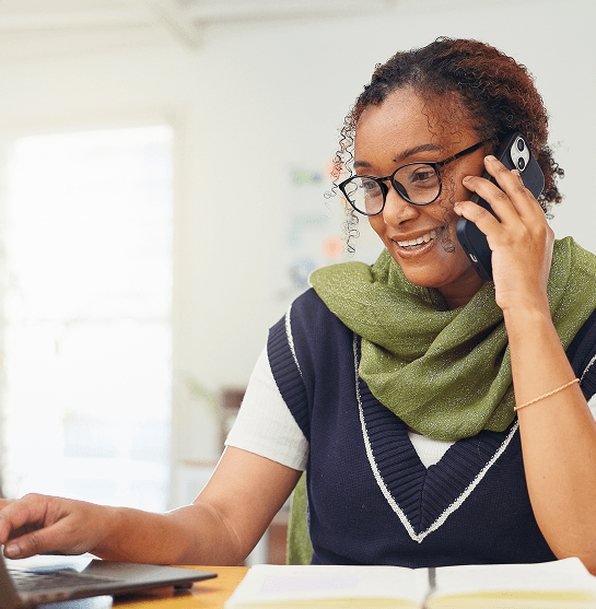 Pillar team member collaborating by phone
