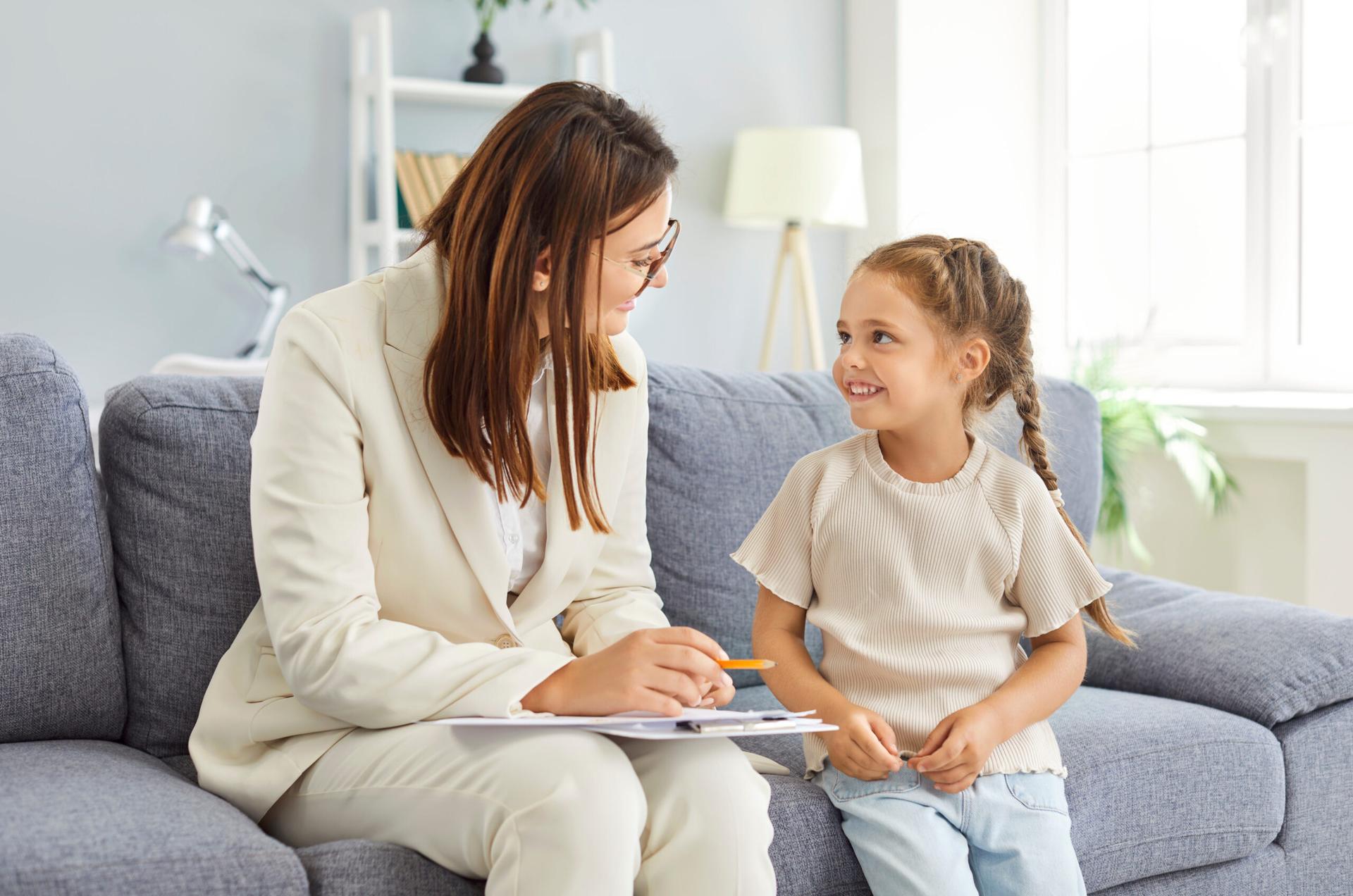 Adult and child sitting together
